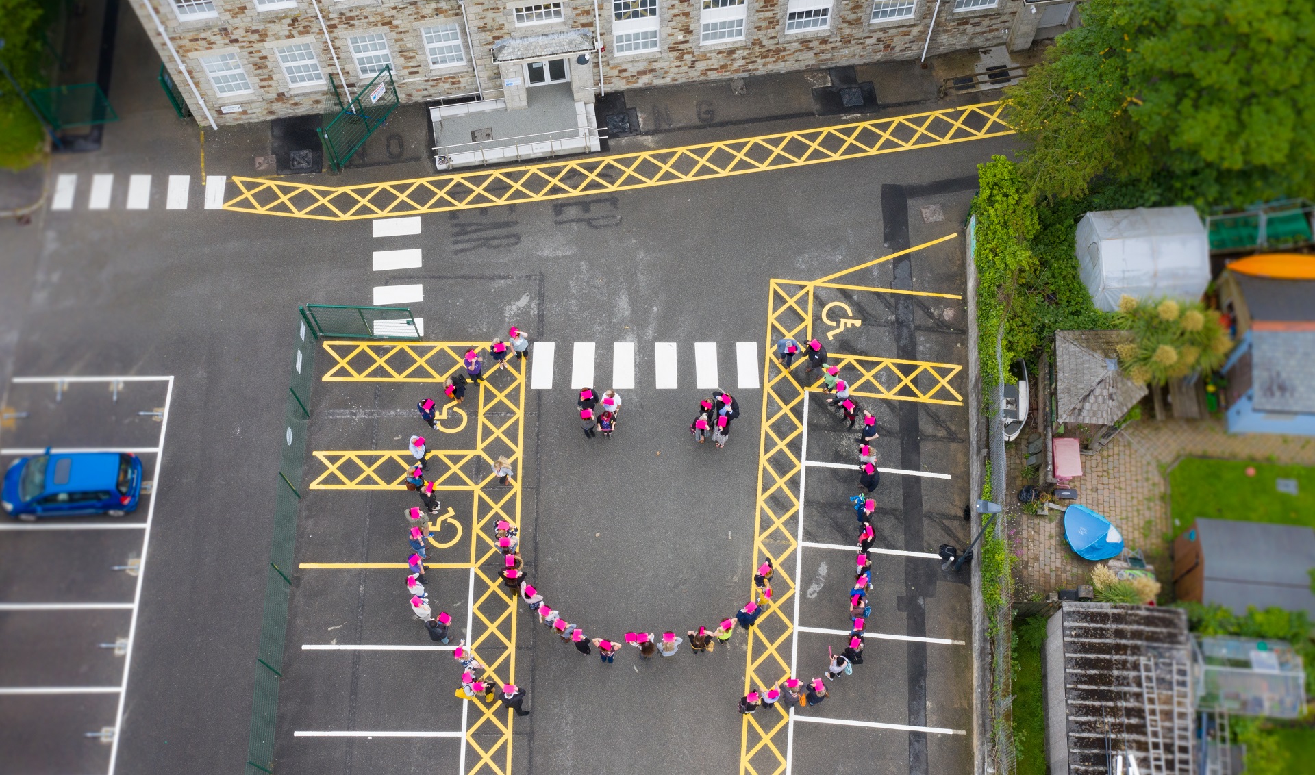Smile Together team launching Harleigh Road by creating our smiley in the carpark edit